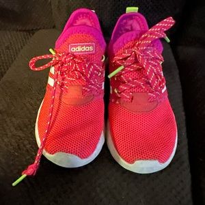 Pink and white adidas shoes